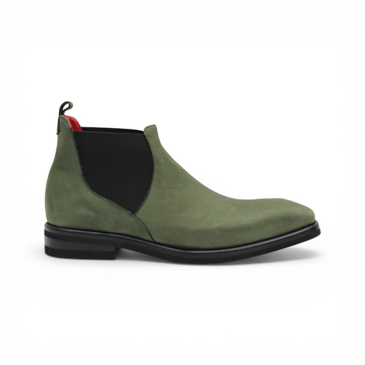 The Emilio Franco EF311 Olive is a green leather Chelsea boot crafted from genuine Italian nabuk, featuring black elastic side panels, a black sole, and a red pull tab at the heel. Presented in profile on a white background, this shoe by Emilio Franco effortlessly blends casual elegance with timeless style.