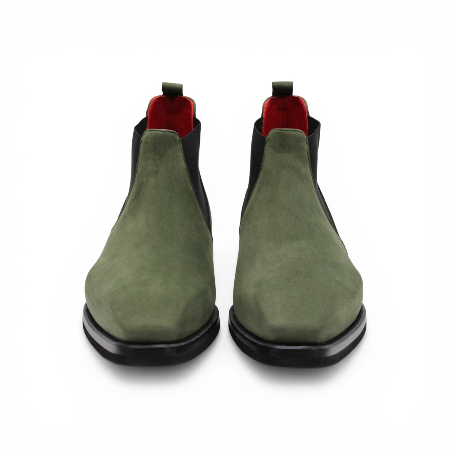 The Emilio Franco EF311 Olive is a green leather Chelsea boot crafted from genuine Italian nabuk, featuring black elastic side panels, a black sole, and a red pull tab at the heel. Presented in profile on a white background, this shoe by Emilio Franco effortlessly blends casual elegance with timeless style.