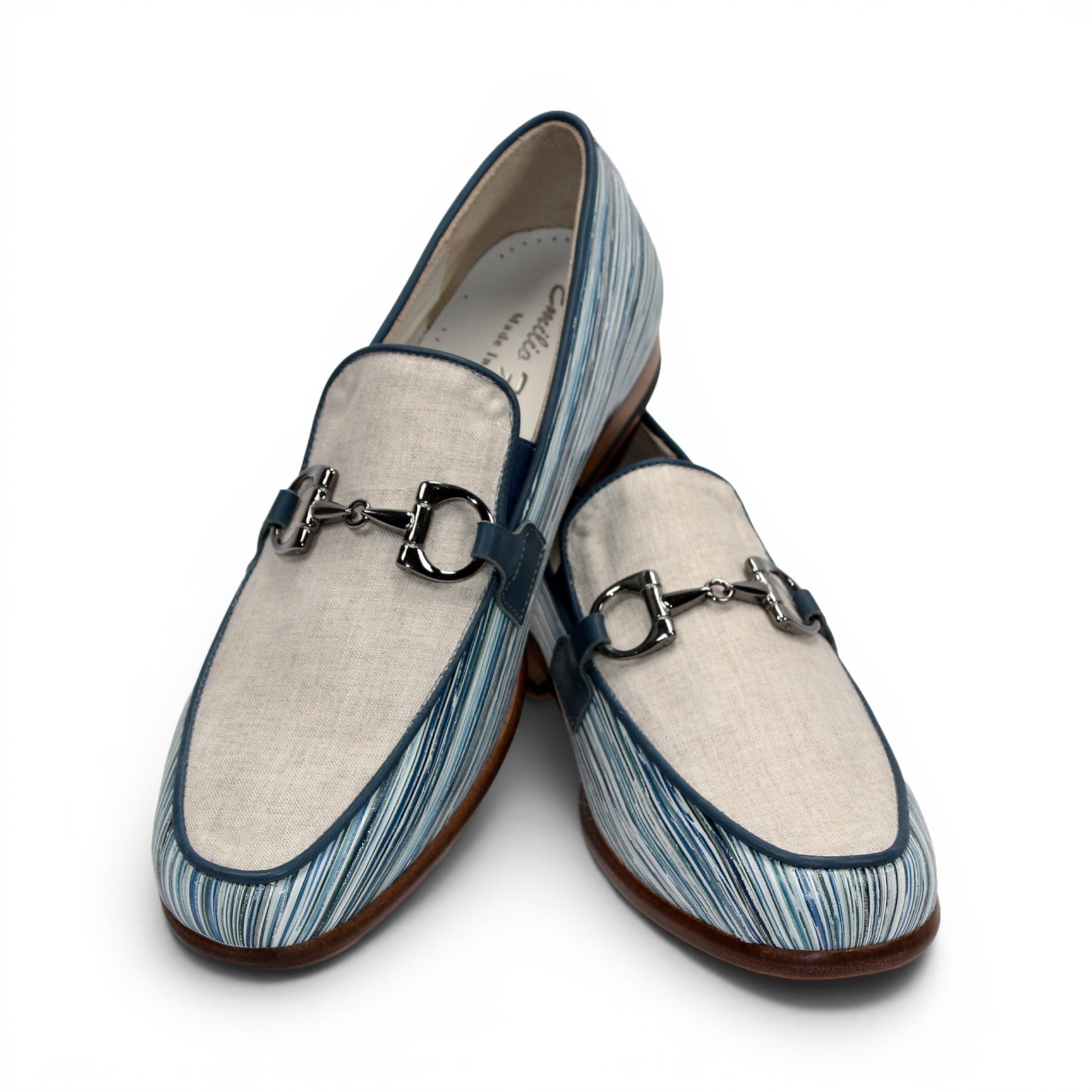 Introducing the Emilio Franco EF439 Blue by Emilio Franco—a luxury men's loafer crafted in Italy. This elegant shoe features a distinctive blue and white patterned calf print leather, complemented by a beige upper section, metal buckle detail, and a brown sole. The footwear is presented in side profile against a white background.