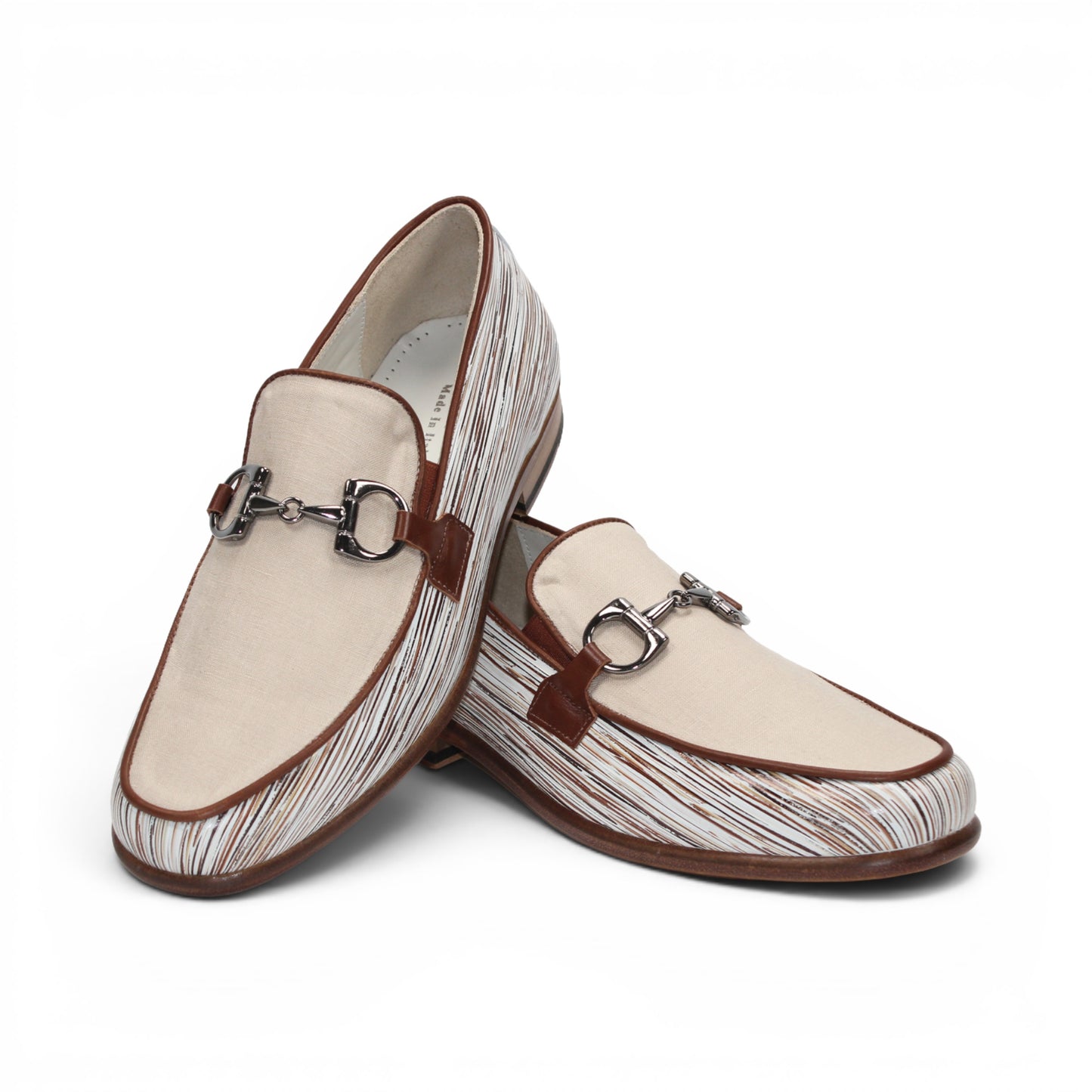 The Emilio Franco EF439 Brown men's loafer by Emilio Franco is crafted in calf print leather with a cream upper, brown trim, silver buckle, and multicolored striped detailing on the sides. This Italian-made shoe features a classic leather sole and is displayed on a white background.
