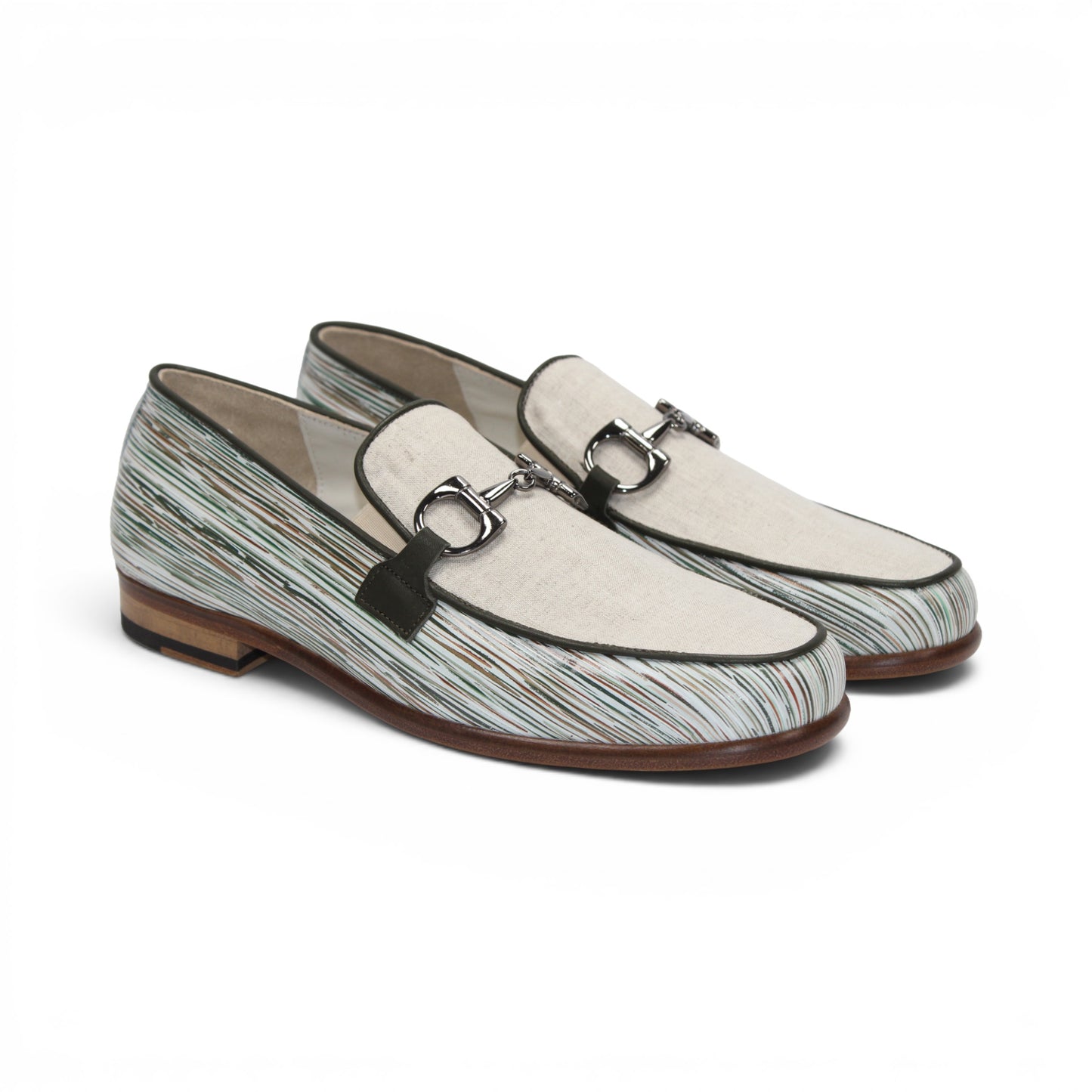 The Emilio Franco EF439 Olive by Emilio Franco is a men’s slip-on loafer in luxury footwear style, featuring a cream calf print leather upper, distinctive white and green striped pattern, silver buckle detail, and a brown sole. The shoe is shown in profile on a white background.