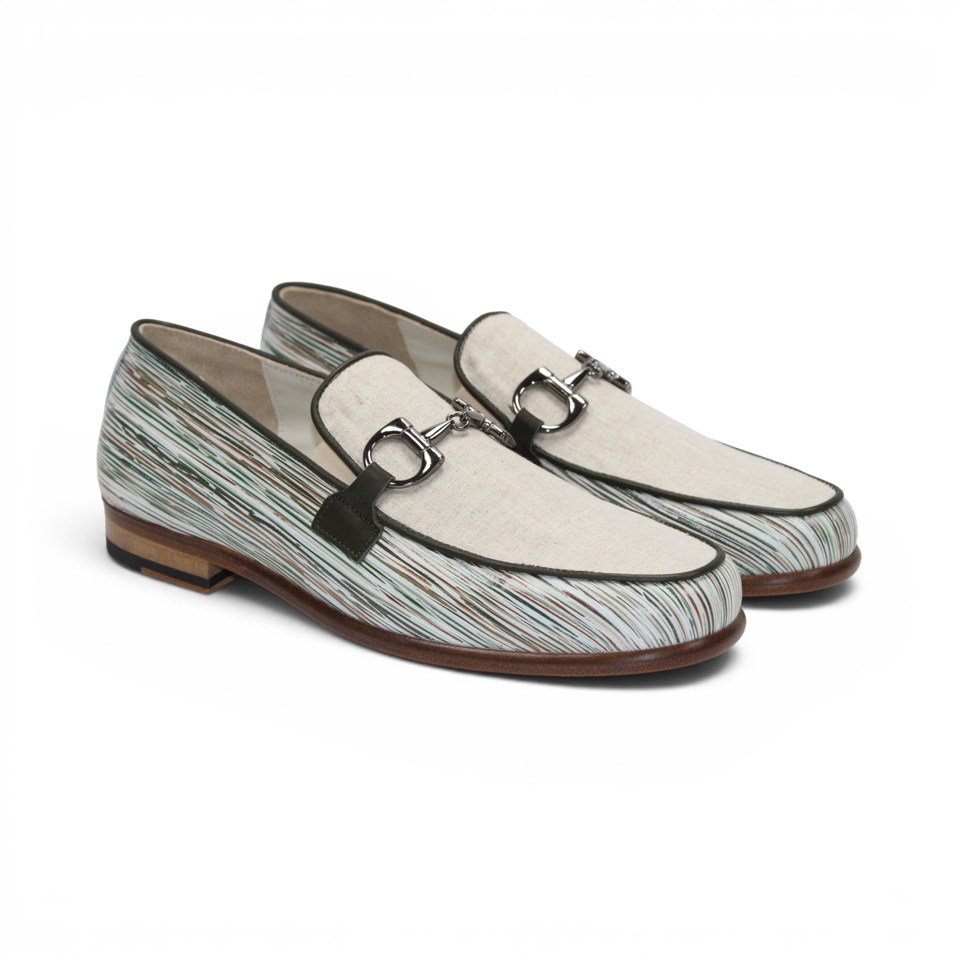 The Emilio Franco EF439 Olive by Emilio Franco is a men’s slip-on loafer in luxury footwear style, featuring a cream calf print leather upper, distinctive white and green striped pattern, silver buckle detail, and a brown sole. The shoe is shown in profile on a white background.