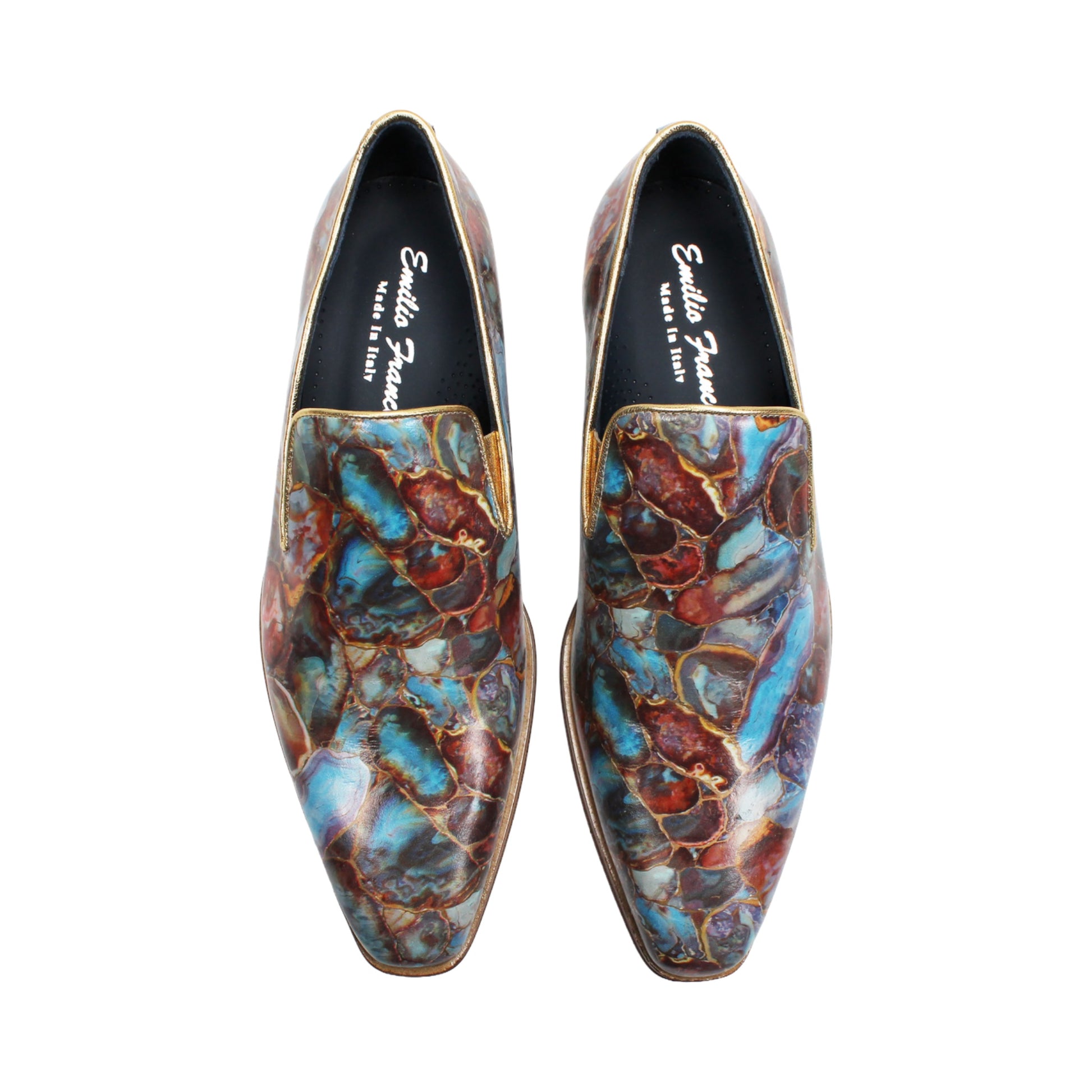 The Emilio Franco EF483 Marble by Emilio Franco is a loafer-style dress shoe showcasing a multicolored, abstract marble calf print in blue, red, and brown tones. It features a low wooden heel, leather sole, and slip-on design—an impressive display of Italian footwear craftsmanship.