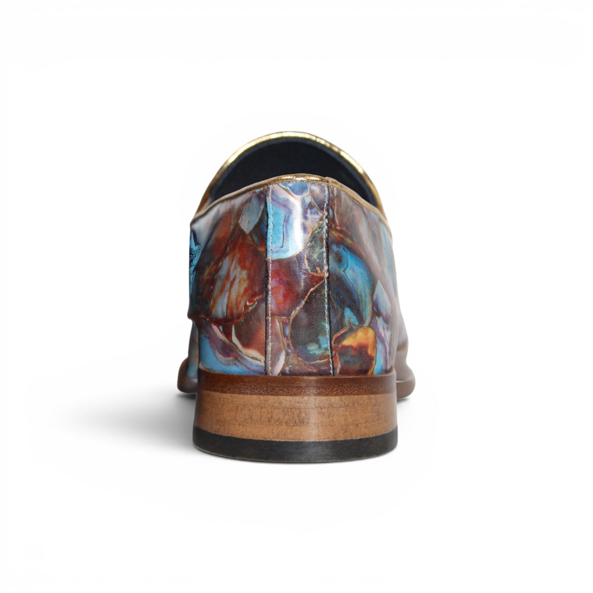 The Emilio Franco EF483 Marble by Emilio Franco is a loafer-style dress shoe showcasing a multicolored, abstract marble calf print in blue, red, and brown tones. It features a low wooden heel, leather sole, and slip-on design—an impressive display of Italian footwear craftsmanship.