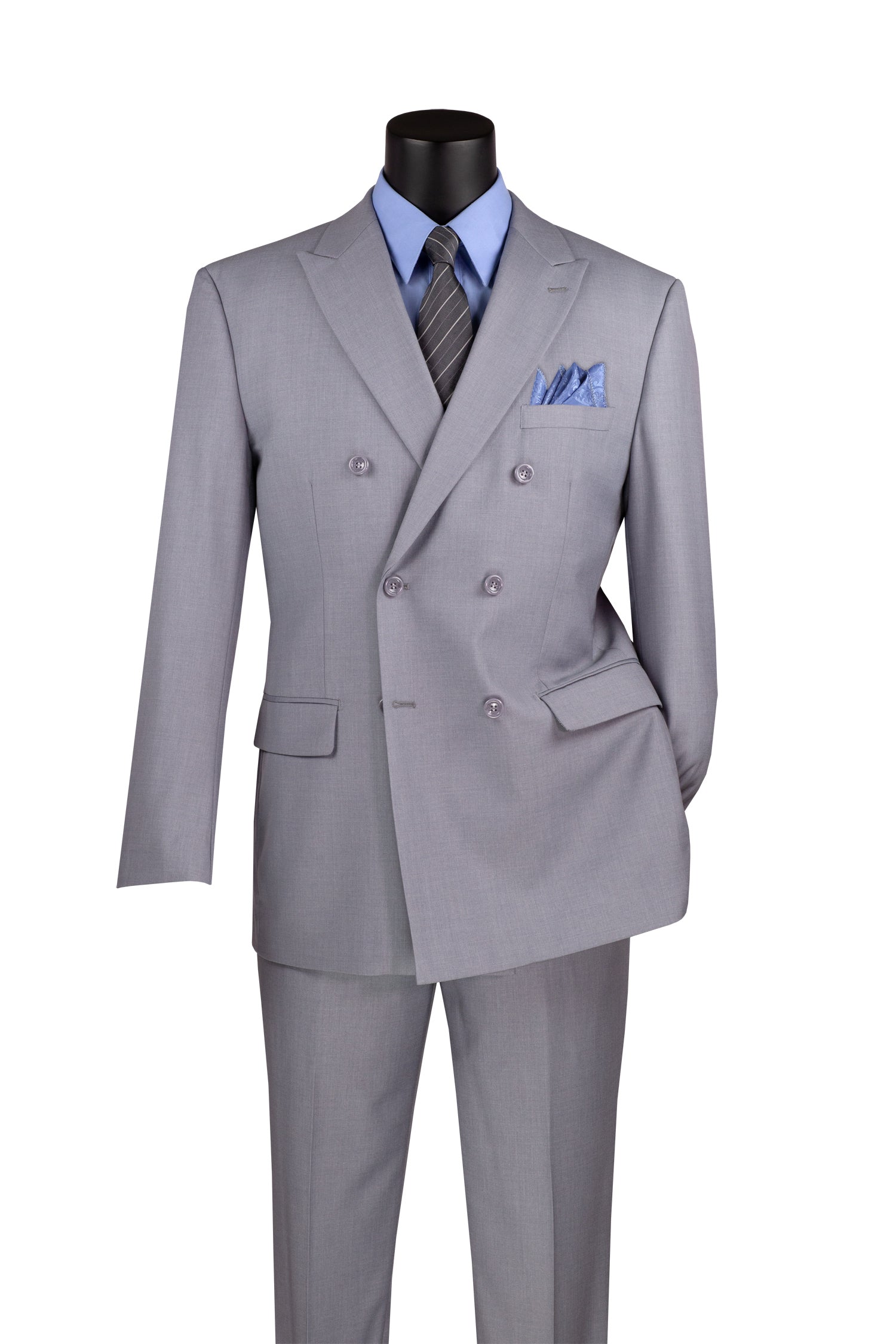 On the mannequin is a sophisticated Vinci Suits regular fit double-breasted suit, wrinkle-resistant in light gray F-DC900. Paired with a blue dress shirt and striped tie, it includes a coordinating blue pocket square, embodying elegance for any occasion.