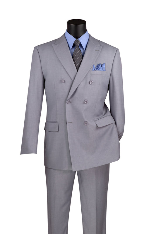On the mannequin is a sophisticated Vinci Suits regular fit double-breasted suit, wrinkle-resistant in light gray F-DC900. Paired with a blue dress shirt and striped tie, it includes a coordinating blue pocket square, embodying elegance for any occasion.