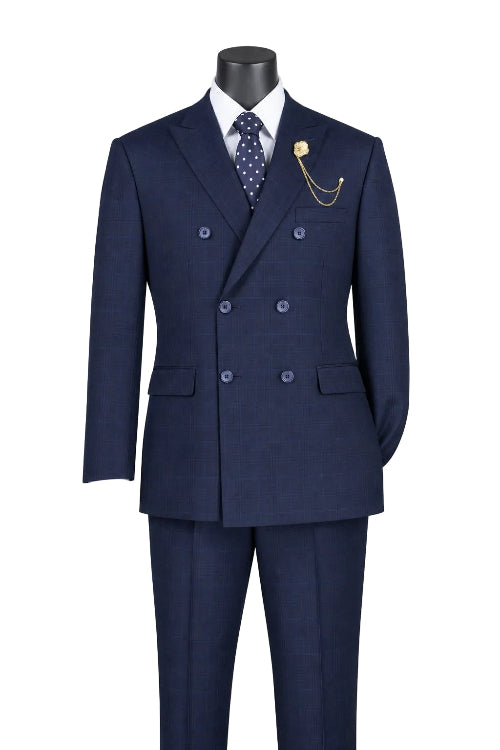 The Regular Fit Navy Glen Plaid Double Breasted 2 Piece Suit F-DRW2 by Vinci Suits is styled on a mannequin with a white shirt, navy polka dot tie, and gold lapel pin with chain.
