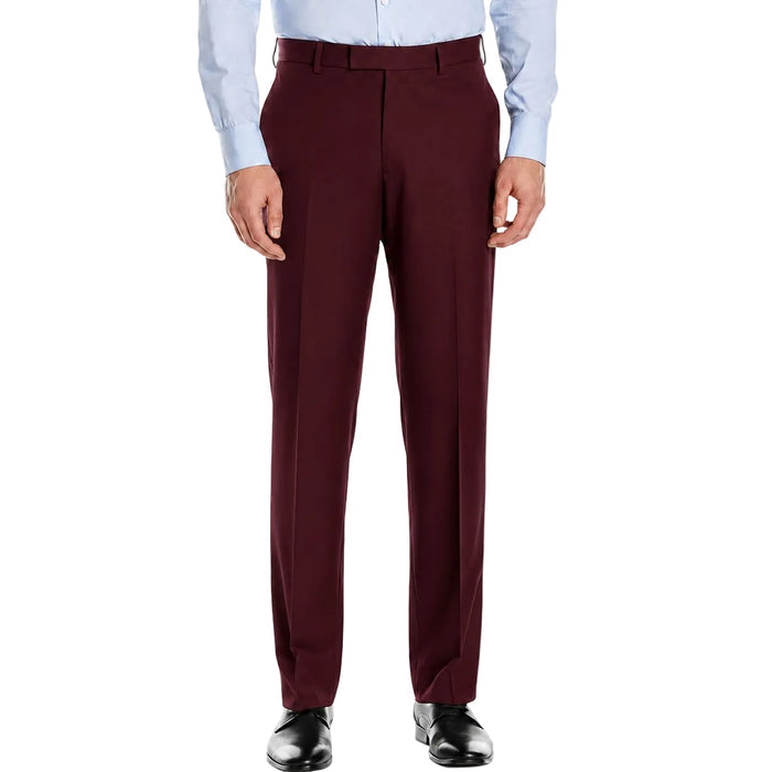 A person wearing Vinci Suits Luxurious Wool Feel Flat Front Pre-Hemmed Dress Pants Burgundy ON-900, a light blue dress shirt, and black shoes stands against a white background.