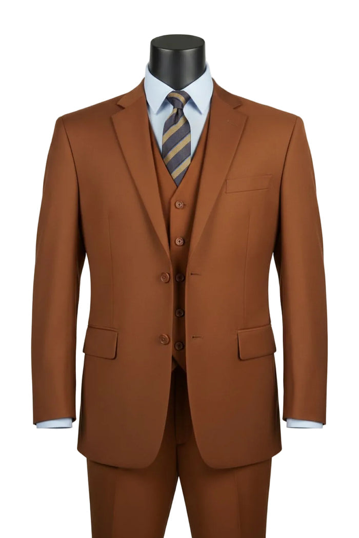 A mannequin wears the Vinci Suits Regular Fit Cognac 3 Piece Suit 2 Button with Adjustable Waistband Pants F-V2TR, styled with a light blue shirt and striped tie.