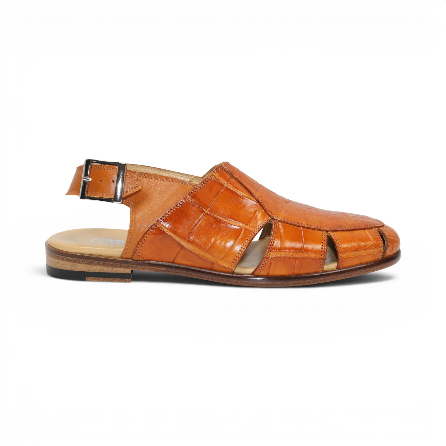 The Fennix F131 Cognac sandal by Fennix of Italy is an open-toe design crafted from genuine alligator leather in a rich brown hue, featuring elegant cut-outs, a slingback strap with side buckle, and a low flat heel—perfect for those who appreciate true luxury footwear. Displayed on a white background.