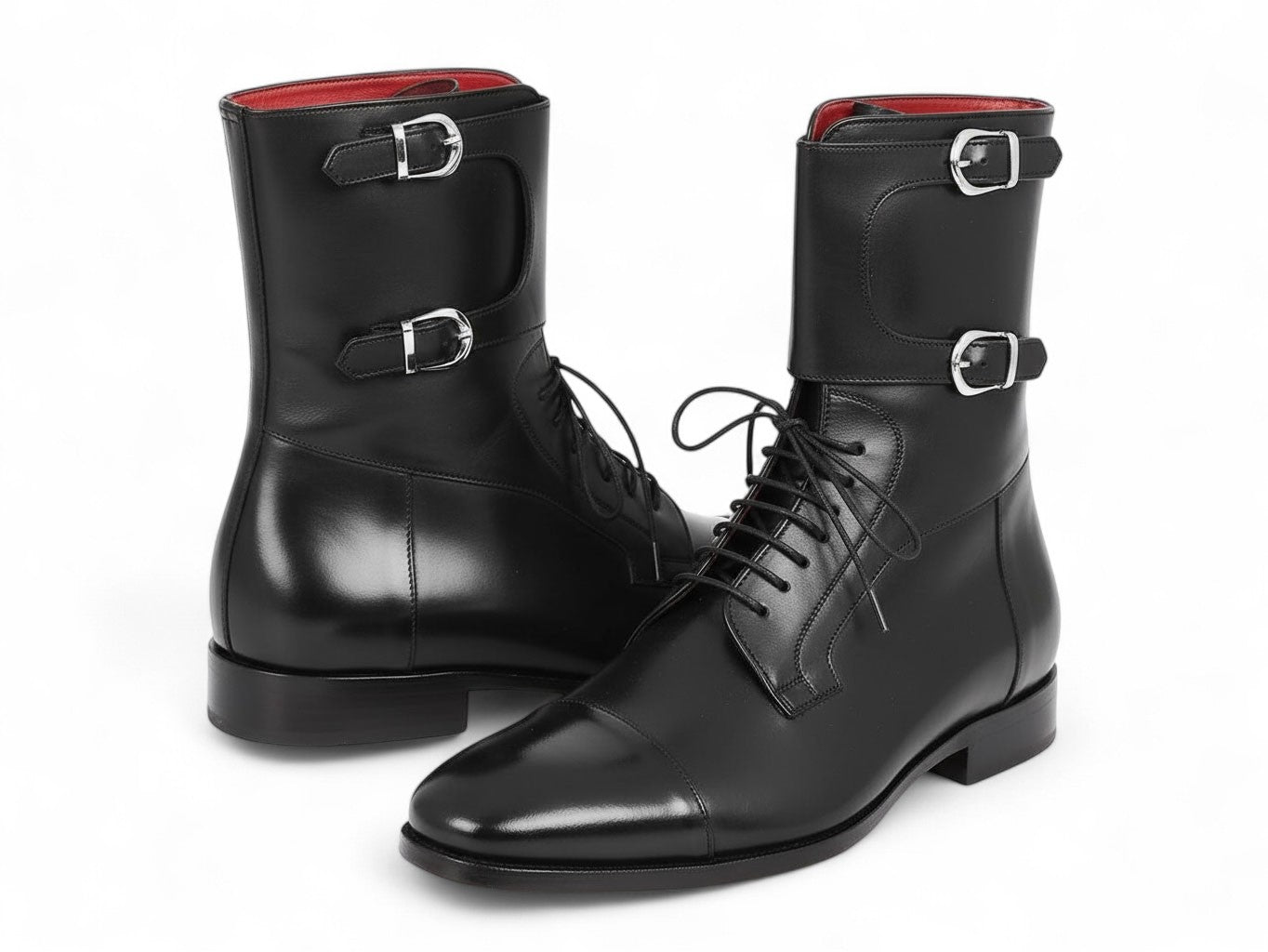 A pair of Paul Parkman High Boots Black Calfskin (F555-BLK) are shown, one upright and one propped horizontally. Both have a slight sheen, black hand-painted finish, cap-toe design, and visible red lining inside.