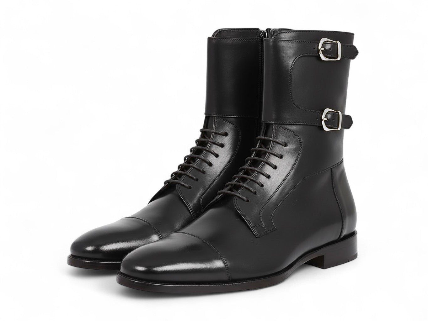 A pair of Paul Parkman High Boots Black Calfskin (F555-BLK) are shown, one upright and one propped horizontally. Both have a slight sheen, black hand-painted finish, cap-toe design, and visible red lining inside.