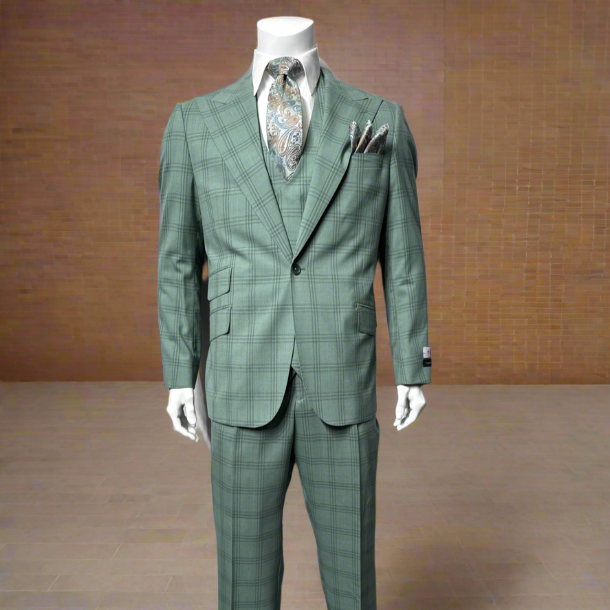 A mannequin wears a green plaid Tiglio Rosso Orvietto Semi Wide Leg TL6372 suit, styled with a white shirt, patterned tie, pocket square, and black shoes, standing against a plain gray background.