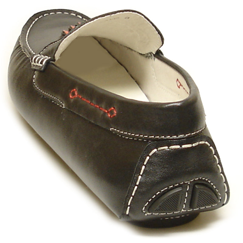 The FI-3085 Black Leather Encore by Fiesso Driving Shoes for men feature fashion-forward white stitching, red accents, and a bold zigzag design on the front upper. Crafted from genuine leather by Fiesso.