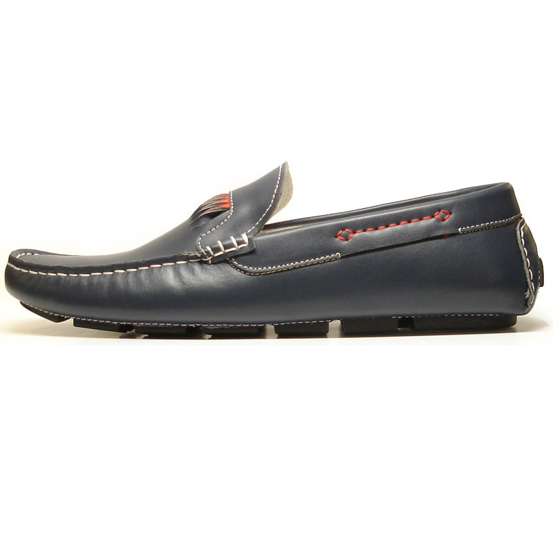 The FI-3085 Navy Leather Encore by Fiesso Driving Shoes feature a dark blue leather upper with white stitching, orange and gray decorative patterns, and a white interior lining.