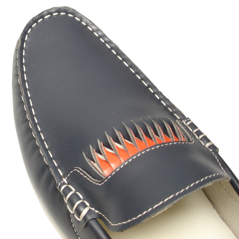 The FI-3085 Navy Leather Encore by Fiesso Driving Shoes feature a dark blue leather upper with white stitching, orange and gray decorative patterns, and a white interior lining.