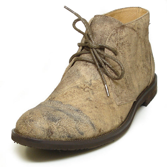 The FI-7002 Brown Encore by Fiesso is a genuine leather men’s boot featuring a scuffed look, dark brown laces, and low heel—classic Fiesso style for a rugged, timeless appeal.