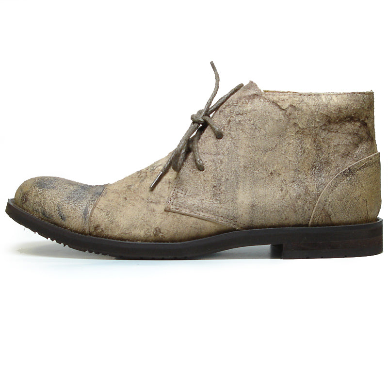 The FI-7002 Brown Encore by Fiesso is a genuine leather men’s boot featuring a scuffed look, dark brown laces, and low heel—classic Fiesso style for a rugged, timeless appeal.