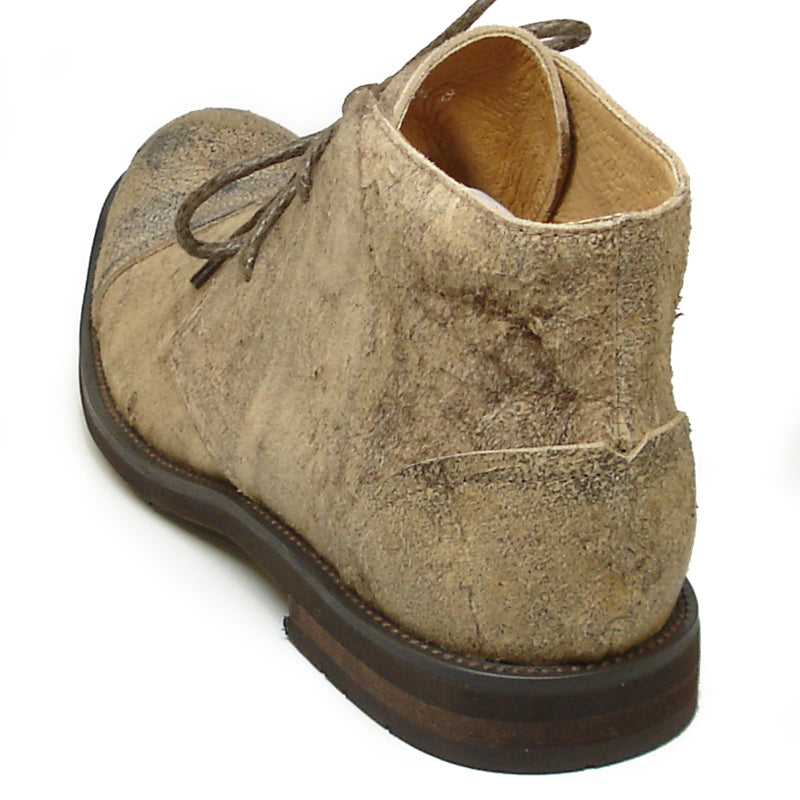 The FI-7002 Brown Encore by Fiesso is a genuine leather men’s boot featuring a scuffed look, dark brown laces, and low heel—classic Fiesso style for a rugged, timeless appeal.