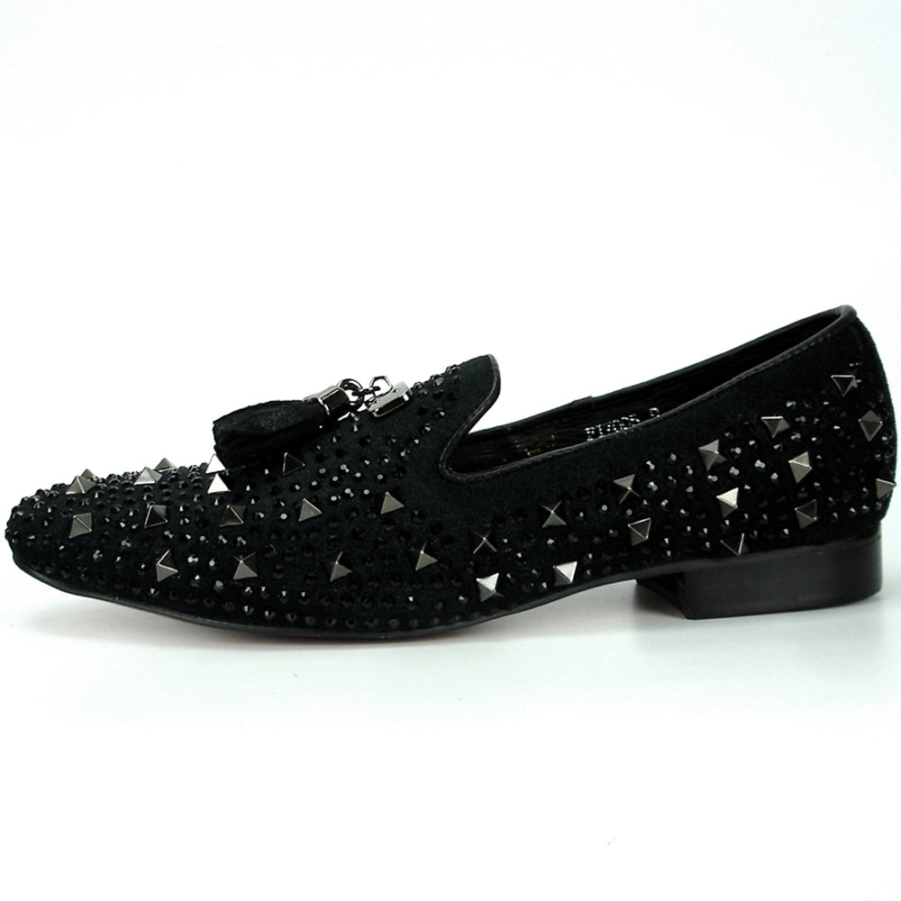 The FI-7005-2 Black With Spikes and Rhinestones Slip-On by Fiesso features black suede, sparkling rhinestones, bold spikes, black tassels, and a metallic front plate—a striking addition to men’s footwear.