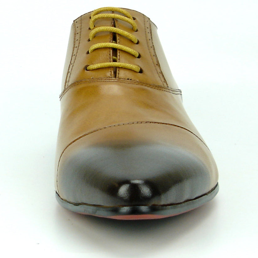FI-7281 Tan Lace Up Encore by Fiesso is a brown leather dress shoe featuring a pointed toe, black gradient tip, yellow laces, and a low heel, artfully photographed on a white background. This remarkable design from Fiesso exemplifies the impeccable quality of handcrafted leather shoes—making it an essential addition to any men’s fashion shoe collection.
