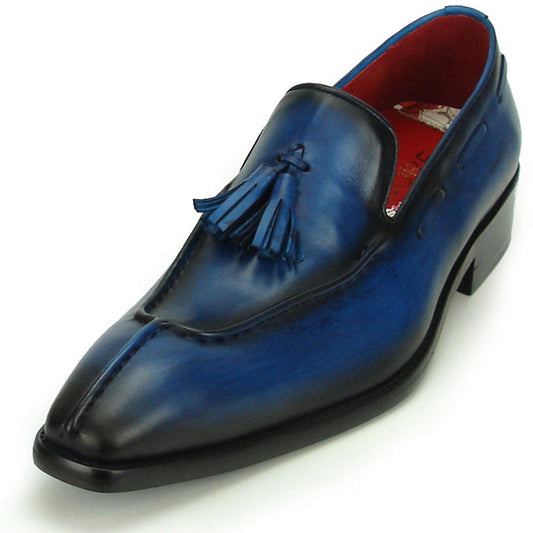 Certainly! Here’s a rewritten version using your specified product data: The FI-8701 Blue Encore by Fiesso is a single blue handcrafted leather tassel loafer featuring black accents, a pointed toe, striking red inner lining, and a low black heel—an exceptional addition to any men’s fashion shoe collection from the renowned brand Fiesso.