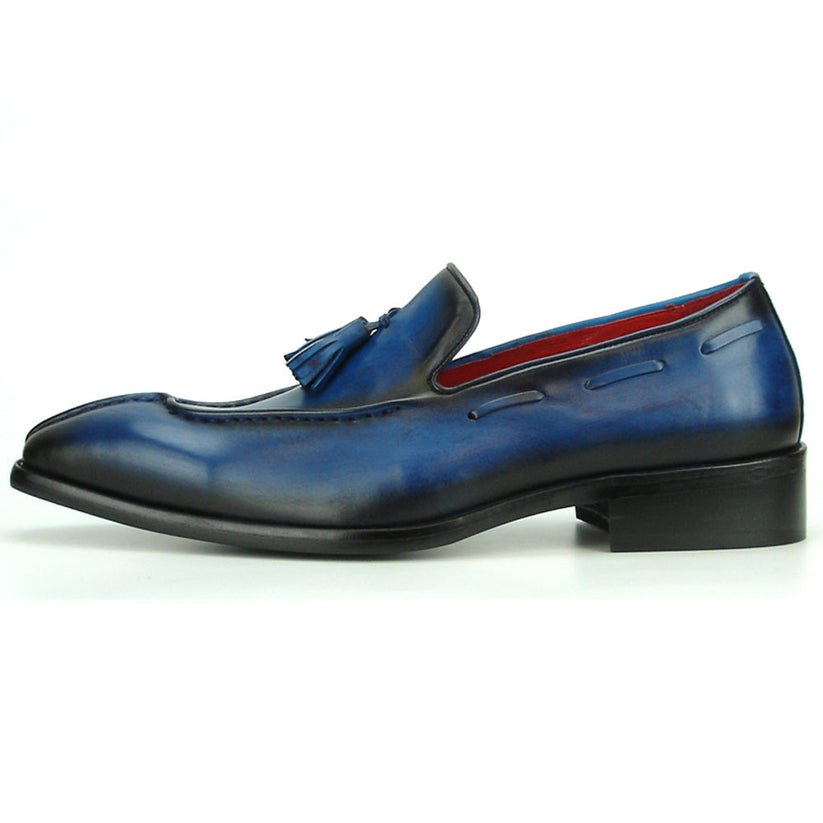 Certainly! Here’s a rewritten version using your specified product data: The FI-8701 Blue Encore by Fiesso is a single blue handcrafted leather tassel loafer featuring black accents, a pointed toe, striking red inner lining, and a low black heel—an exceptional addition to any men’s fashion shoe collection from the renowned brand Fiesso.