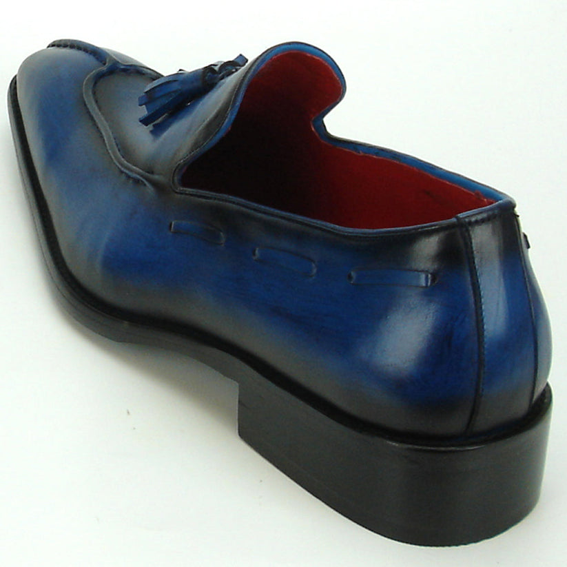 Certainly! Here’s a rewritten version using your specified product data: The FI-8701 Blue Encore by Fiesso is a single blue handcrafted leather tassel loafer featuring black accents, a pointed toe, striking red inner lining, and a low black heel—an exceptional addition to any men’s fashion shoe collection from the renowned brand Fiesso.