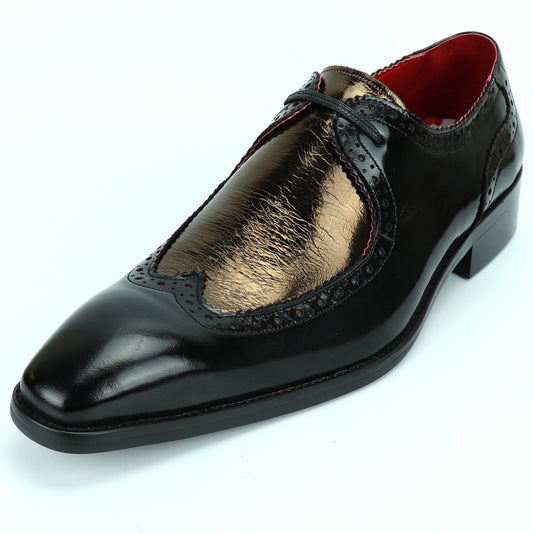 Introducing the FI-8704 Black Gold Encore by Fiesso—a striking black dress shoe featuring glossy leather, metallic gold detailing, intricate brogue accents, a low heel, classic black laces, and a rich red interior lining. This expertly handcrafted shoe personifies the bold sophistication of men’s fashion footwear and exemplifies the signature luxury style that defines Fiesso.