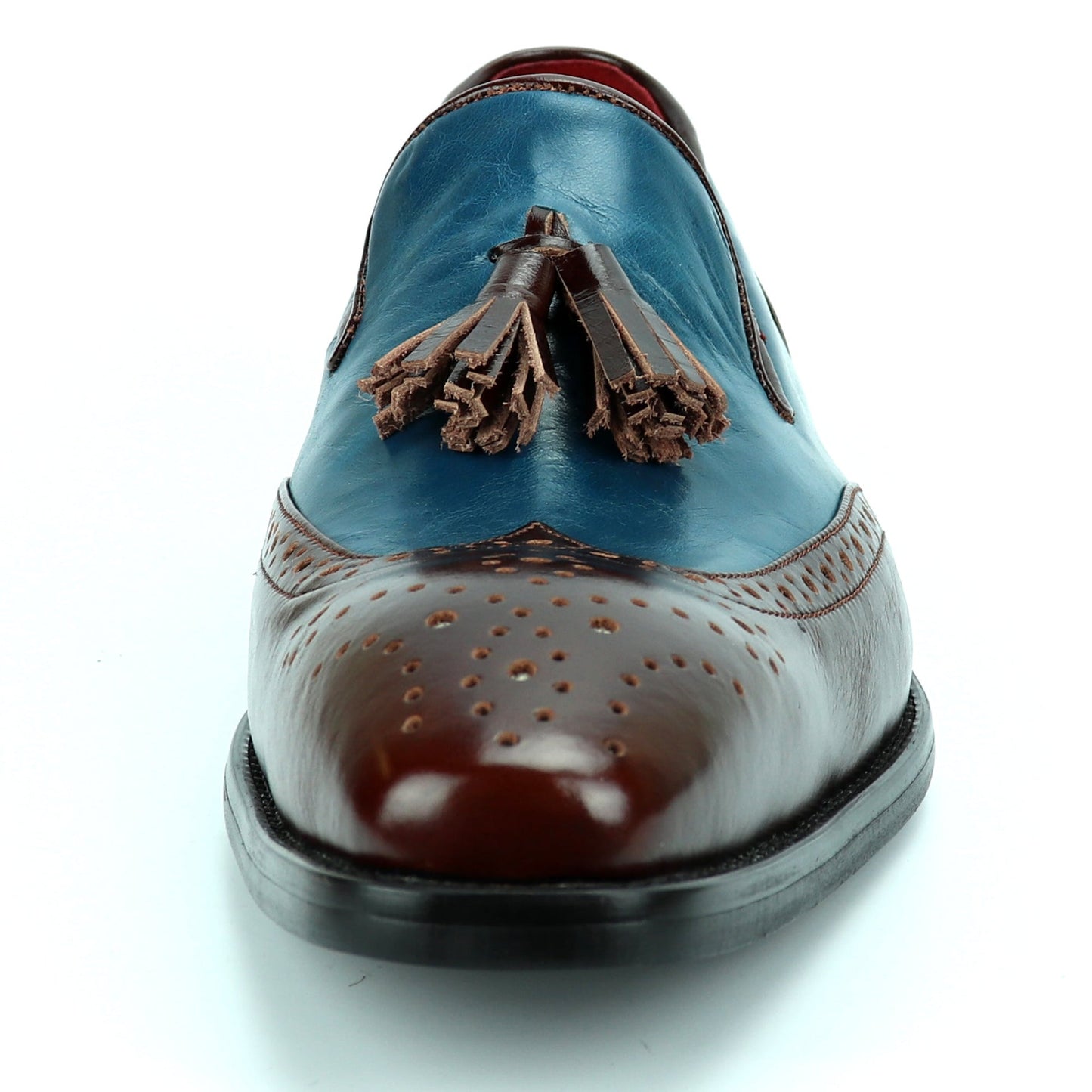 The FI-8705 Burgundy Blue Wing Tip With Tassel Encore by Fiesso features premium leather in burgundy and blue, classic brogue perforations, front tassels, and a black sole—perfect for elevating any outfit with Fiesso’s signature style.