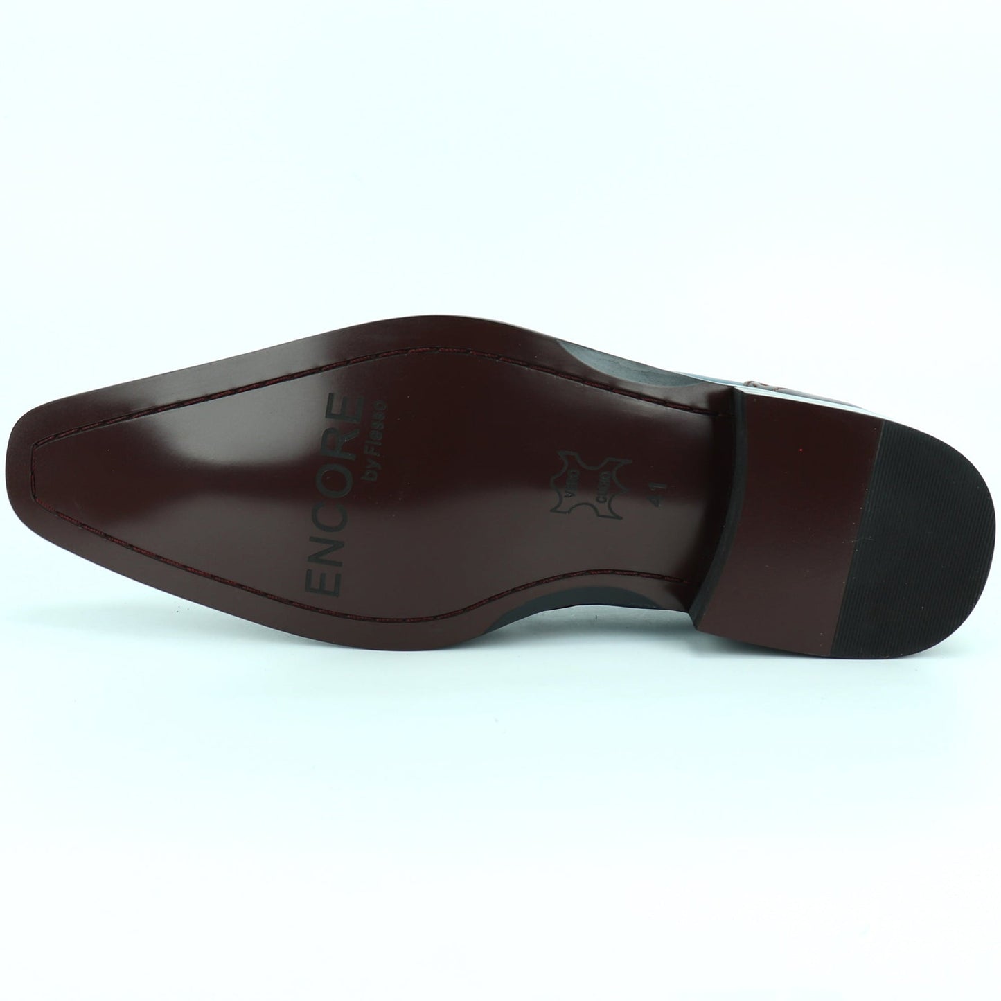 The FI-8705 Burgundy Blue Wing Tip With Tassel Encore by Fiesso features premium leather in burgundy and blue, classic brogue perforations, front tassels, and a black sole—perfect for elevating any outfit with Fiesso’s signature style.