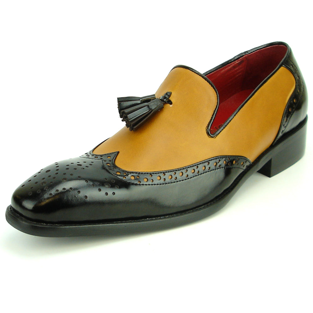Elevate your style with the Fiesso FI-8705 Black Tan Wing Tip With Tassel Encore—a two-tone men’s loafer featuring black and tan leather, perforated details, a tassel, and low heel. Perfect for classic, fashionable looks.