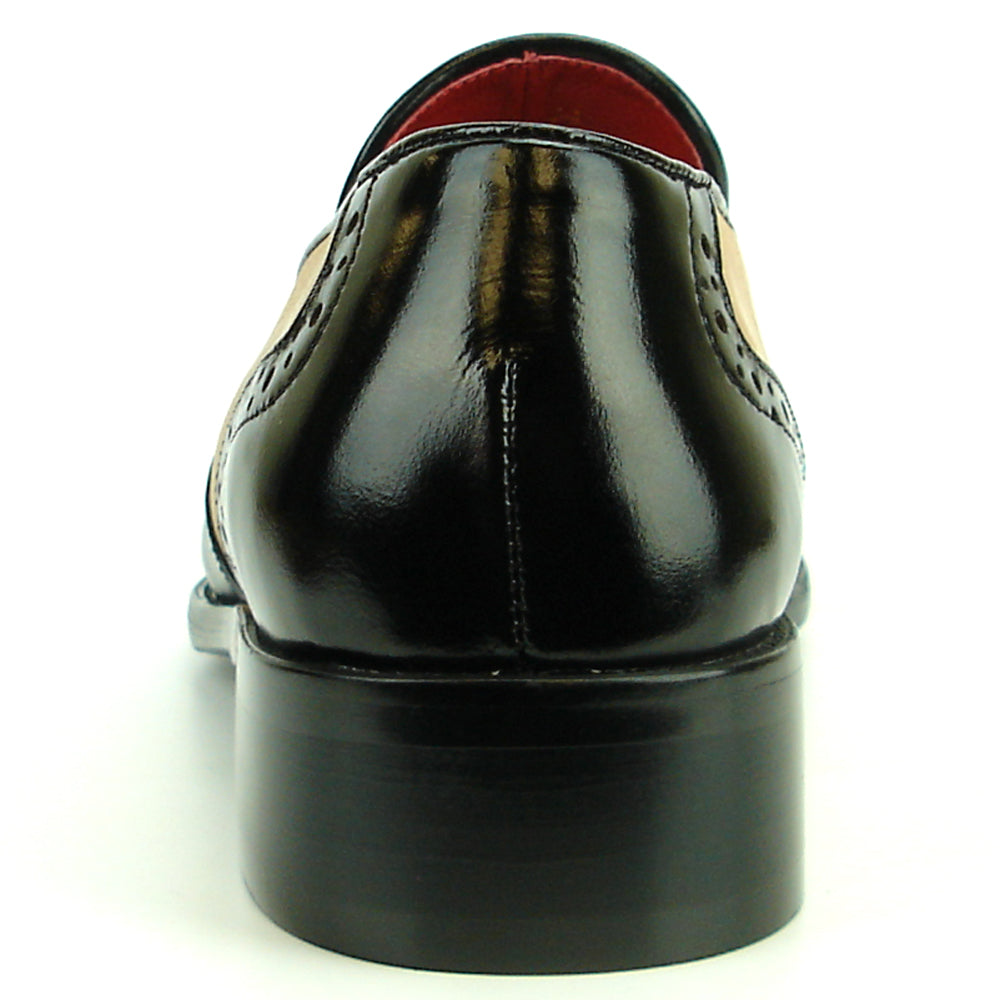Elevate your style with the Fiesso FI-8705 Black Tan Wing Tip With Tassel Encore—a two-tone men’s loafer featuring black and tan leather, perforated details, a tassel, and low heel. Perfect for classic, fashionable looks.