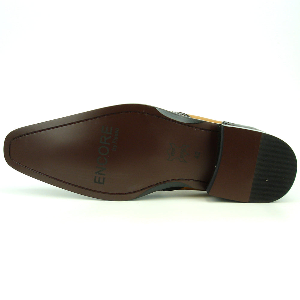 Elevate your style with the Fiesso FI-8705 Black Tan Wing Tip With Tassel Encore—a two-tone men’s loafer featuring black and tan leather, perforated details, a tassel, and low heel. Perfect for classic, fashionable looks.