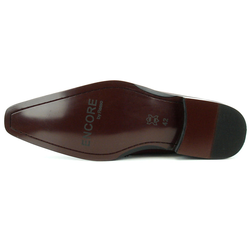 A handcrafted burgundy leather Chelsea boot with black wingtip brogue detailing, elastic side panels, and a low heel—shown on a white background—FI-8708 Wing Tip Boot Encore by Fiesso exemplifies men’s fashion boots from the brand.