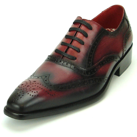 Introducing the FI-8710 Burgundy Wing Tip Encore by Fiesso—a single oxford dress shoe crafted from burgundy and black handcrafted leather, featuring classic brogue detailing, black laces, and a stylish low heel. This exceptional shoe from Fiesso is a standout choice for those seeking distinctive men’s fashion footwear.