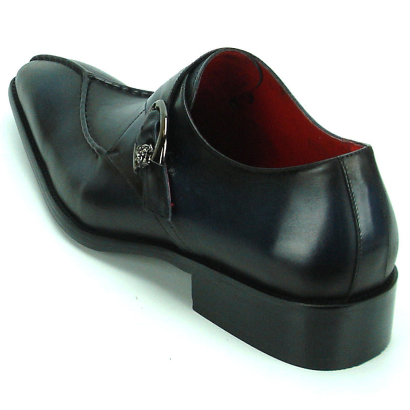 Sleek black men’s leather FI-8712 Black Encore by Fiesso shoes with a pointed toe, low heel, silver buckle detail, and striking red inner lining—these Fiesso monk strap shoes are displayed on a white background.