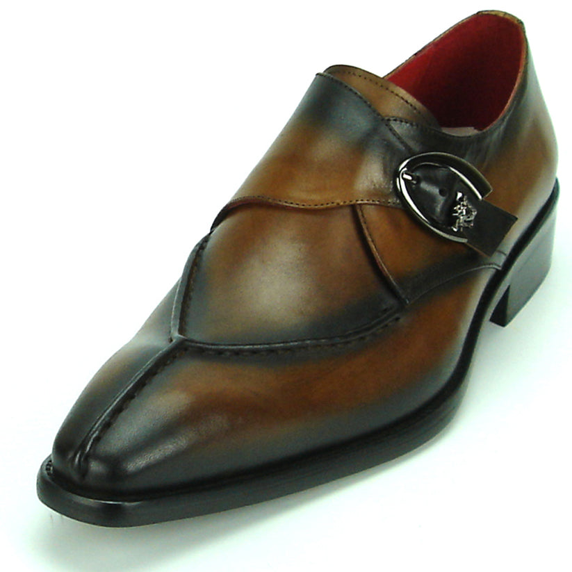 FI-8712 Coffee Encore by Fiesso—this handcrafted men’s dress shoe features rich brown leather, a pointed toe, black accent panels, a sleek side buckle, and a low heel. Displayed against a white background, it exemplifies the distinguished elegance of the Fiesso brand.