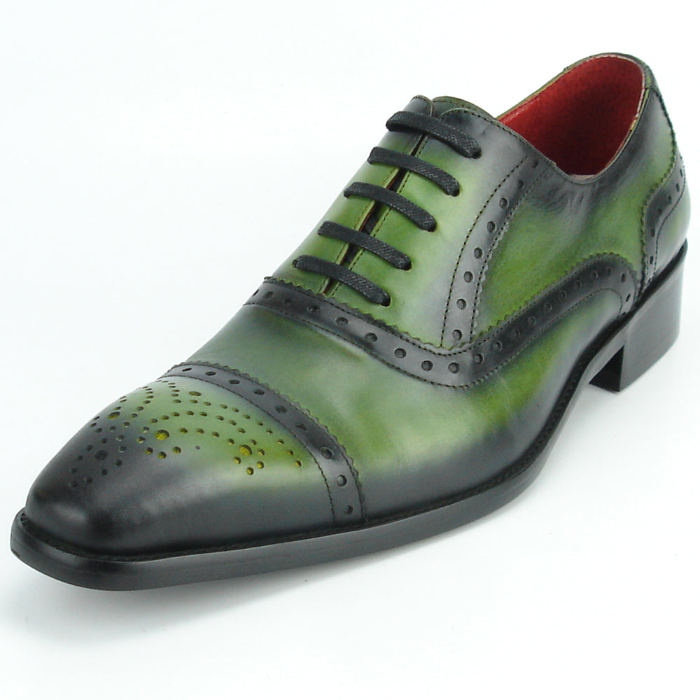 The FI-8713 Green Leather Cap Toe Lace Up Encore by Fiesso features green and black leather, brogue details, black laces, a low heel, and red lining—ideal for elevating men’s style. Photographed on a white background.