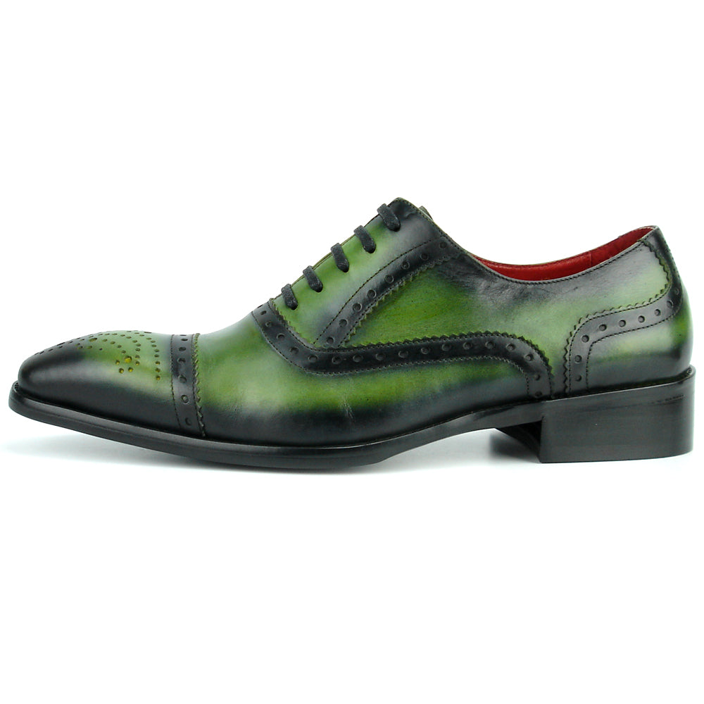 The FI-8713 Green Leather Cap Toe Lace Up Encore by Fiesso features green and black leather, brogue details, black laces, a low heel, and red lining—ideal for elevating men’s style. Photographed on a white background.