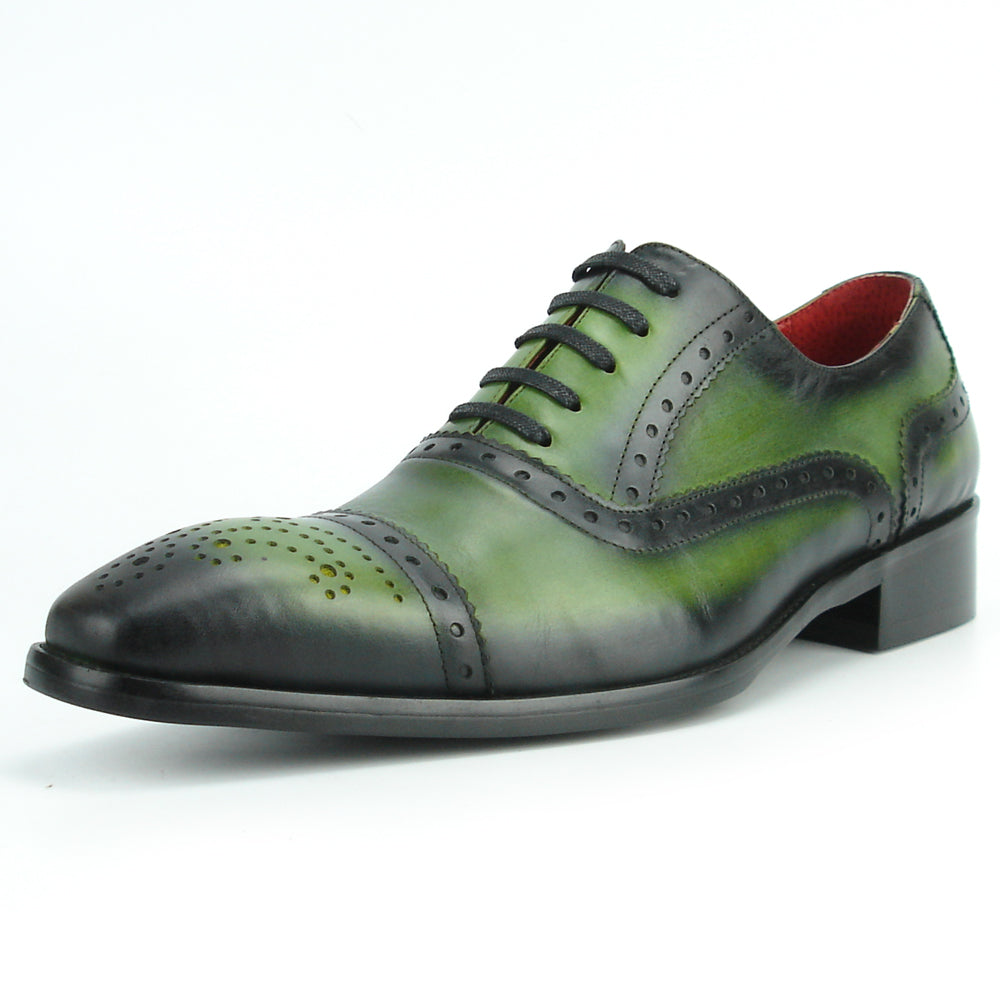 The FI-8713 Green Leather Cap Toe Lace Up Encore by Fiesso features green and black leather, brogue details, black laces, a low heel, and red lining—ideal for elevating men’s style. Photographed on a white background.
