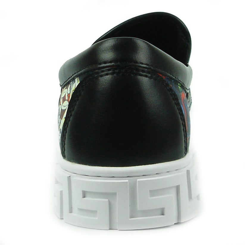 The FI-2344 Ace of Hearts Print Slip on Low Cut Sneaker by Fiesso features a white sole and colorful playing card and dice-themed upper, showcasing Encore by Fiesso’s bold men’s slip-on style.