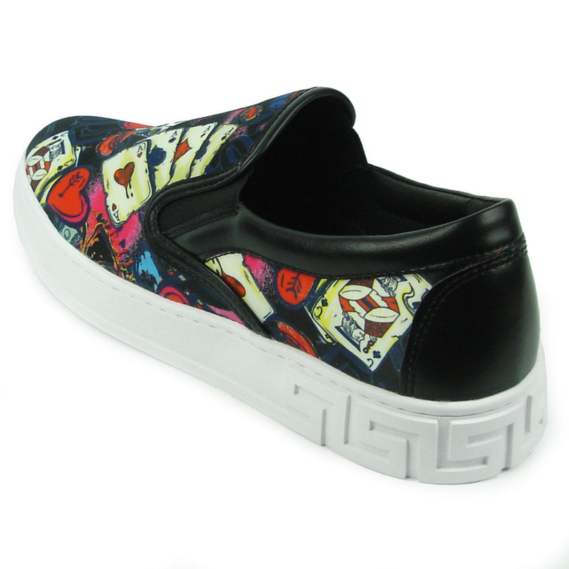 The FI-2344 Ace of Hearts Print Slip on Low Cut Sneaker by Fiesso features a white sole and colorful playing card and dice-themed upper, showcasing Encore by Fiesso’s bold men’s slip-on style.