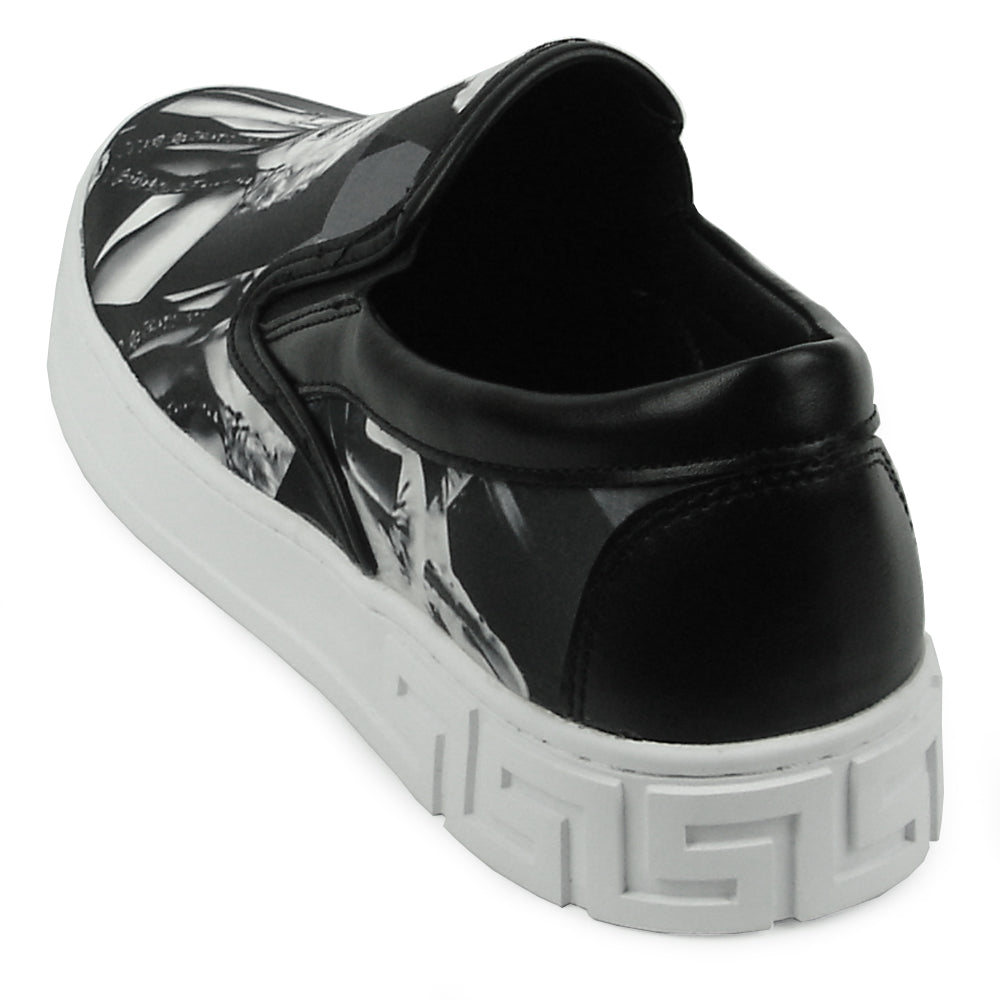The FI-2346 Marilyn Monroe Print Slip on Low Cut Sneaker Encore by Fiesso features a classic Hollywood style Marilyn Monroe print, black upper, and white sole—an iconic, stylish men's fashion sneaker from the Fiesso brand.