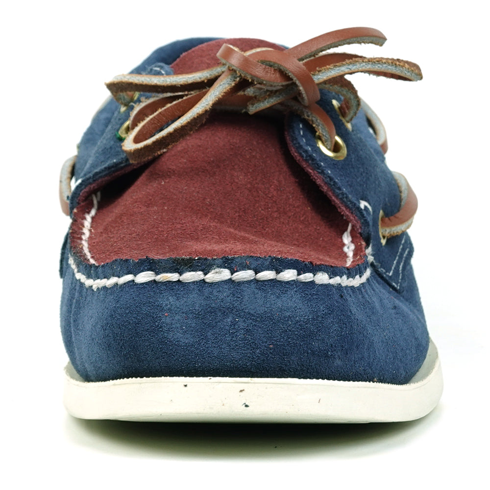 The FI-6512-S Navy Burgundy suede lace-up boat shoes by Fiesso feature white stitching, brown leather laces, and a white rubber sole—perfect for elevating men’s style with classic Fiesso flair.