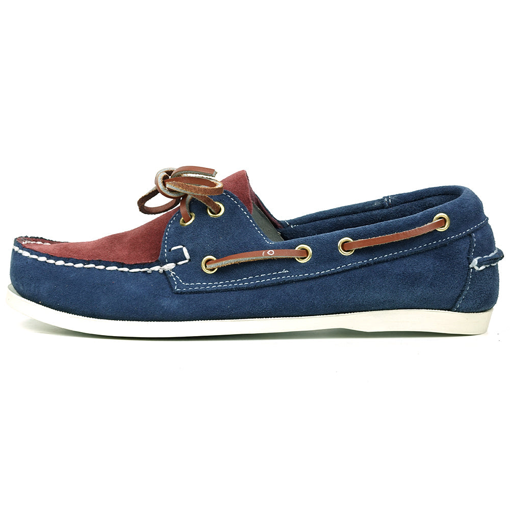 The FI-6512-S Navy Burgundy suede lace-up boat shoes by Fiesso feature white stitching, brown leather laces, and a white rubber sole—perfect for elevating men’s style with classic Fiesso flair.