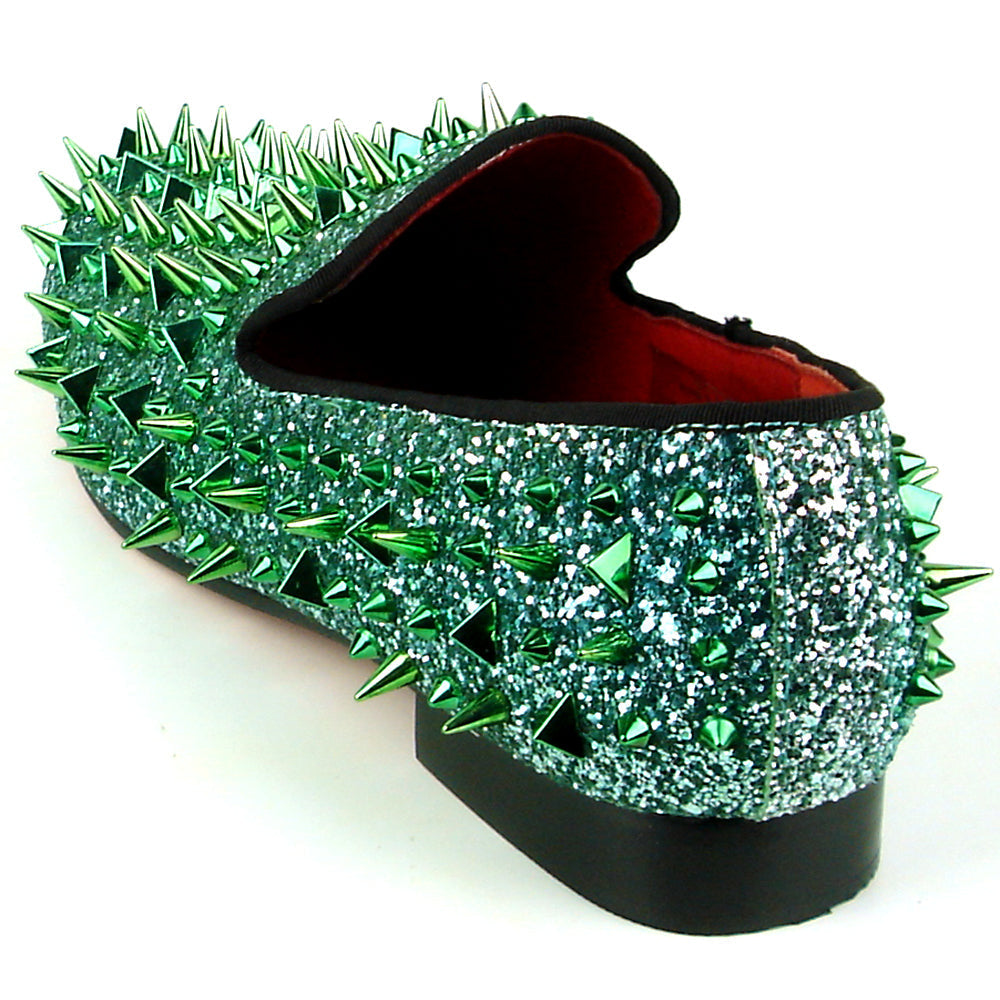 The FI-7239 Green Glitter Green Spikes Slip on Loafer by Fiesso features dazzling green glitter, metallic spikes, handcrafted leather details, a bold red lining, and a black sole—a standout piece for men's fashion.