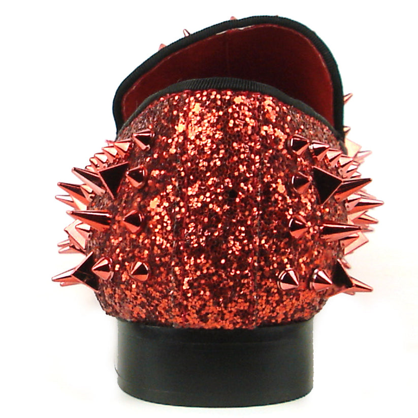 Introducing the FI-7239 Red Glitter Red Spikes by Fiesso, this striking slip-on shoe features a radiant red glitter finish and is adorned with an array of pointed metal spikes in various sizes. Crafted by Fiesso by Aurelio Garcia, this bold men’s fashion shoe redefines style boundaries with its handcrafted leather construction.