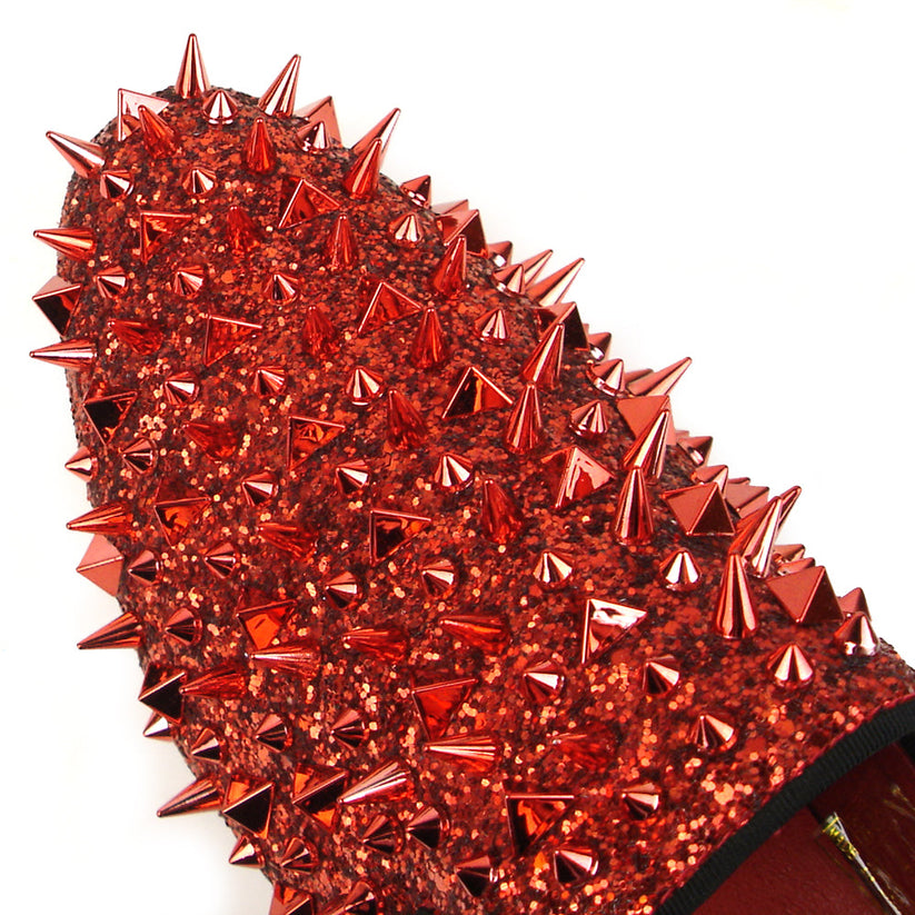 Introducing the FI-7239 Red Glitter Red Spikes by Fiesso, this striking slip-on shoe features a radiant red glitter finish and is adorned with an array of pointed metal spikes in various sizes. Crafted by Fiesso by Aurelio Garcia, this bold men’s fashion shoe redefines style boundaries with its handcrafted leather construction.