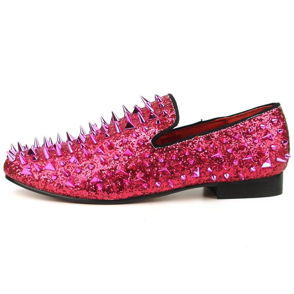The FI-7239 Rose Glitter Rose Spikes Slip on Loafer by Fiesso features hand-crafted pink glittery leather, striking pointed metallic spikes, and a black sole—a bold, standout choice in men’s fashion.